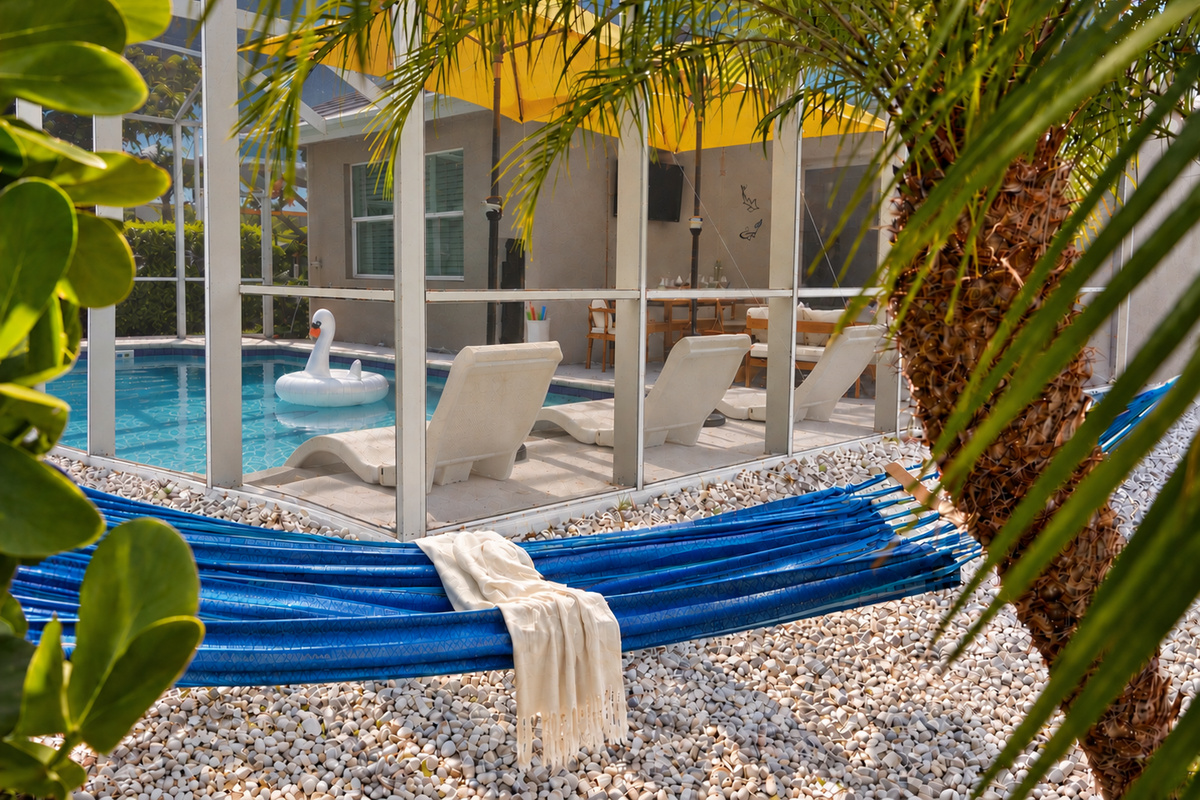Your front row seat to paradise. Nestled under the shade of the palms, this private hammock is the ultimate spot to lounge while overlooking the pool and your own mini-putt course. Finally read the book you've been wanting to!