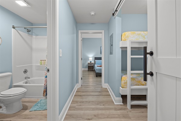 Bunk room on the right, 2nd bath on the left and 2nd King bed at end of hall.  Both bedrooms have lake view