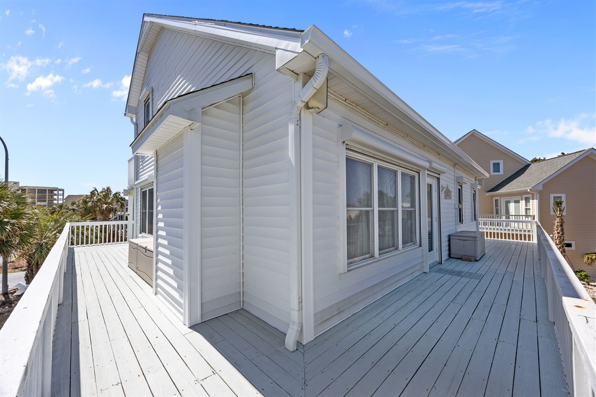 Spacious wraparound deck with plenty of room to enjoy the coastal breeze