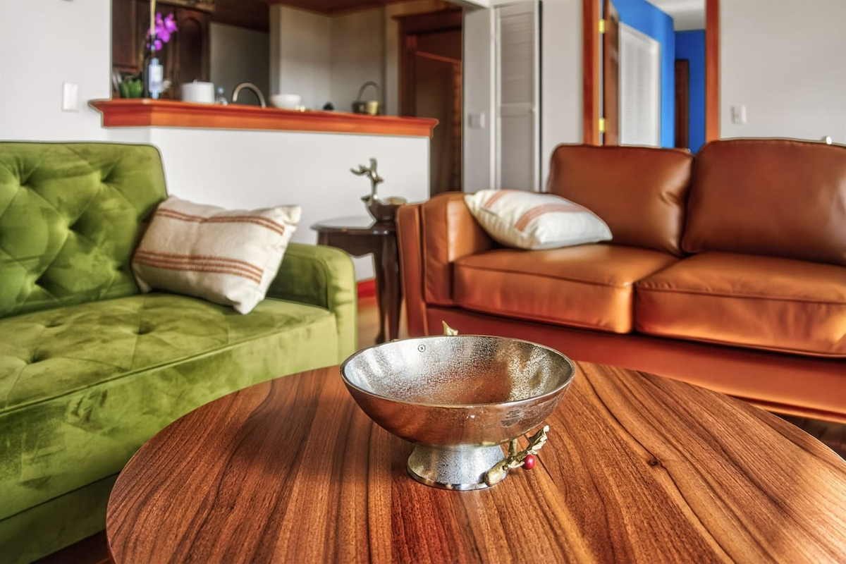 Cozy living area with stylish seating and warm tones—perfect for relaxing, socializing, and feeling right at home.