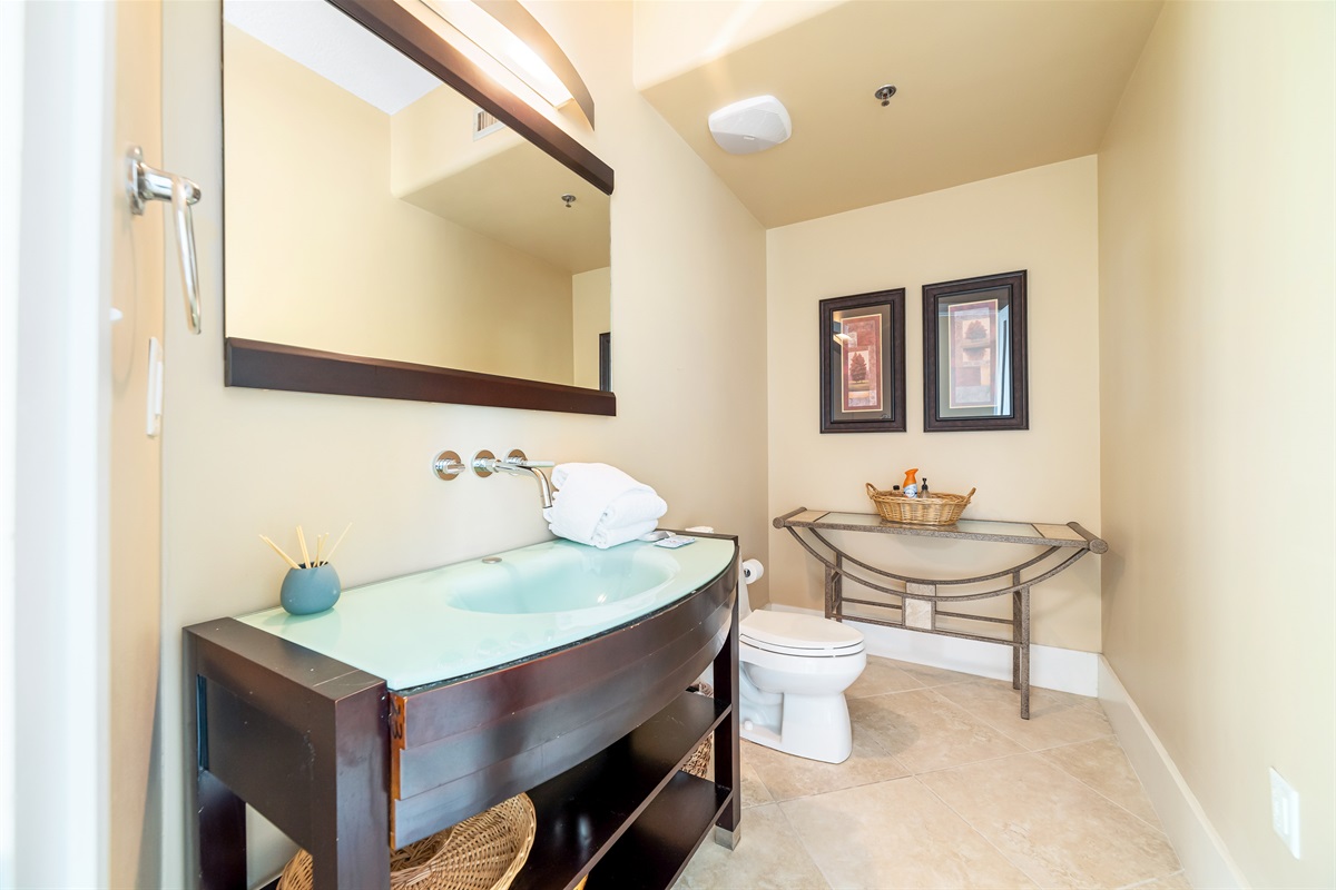 Enjoy the convenience of this well-appointed half bathroom. We provide fresh towels and essential toiletries for your comfort.