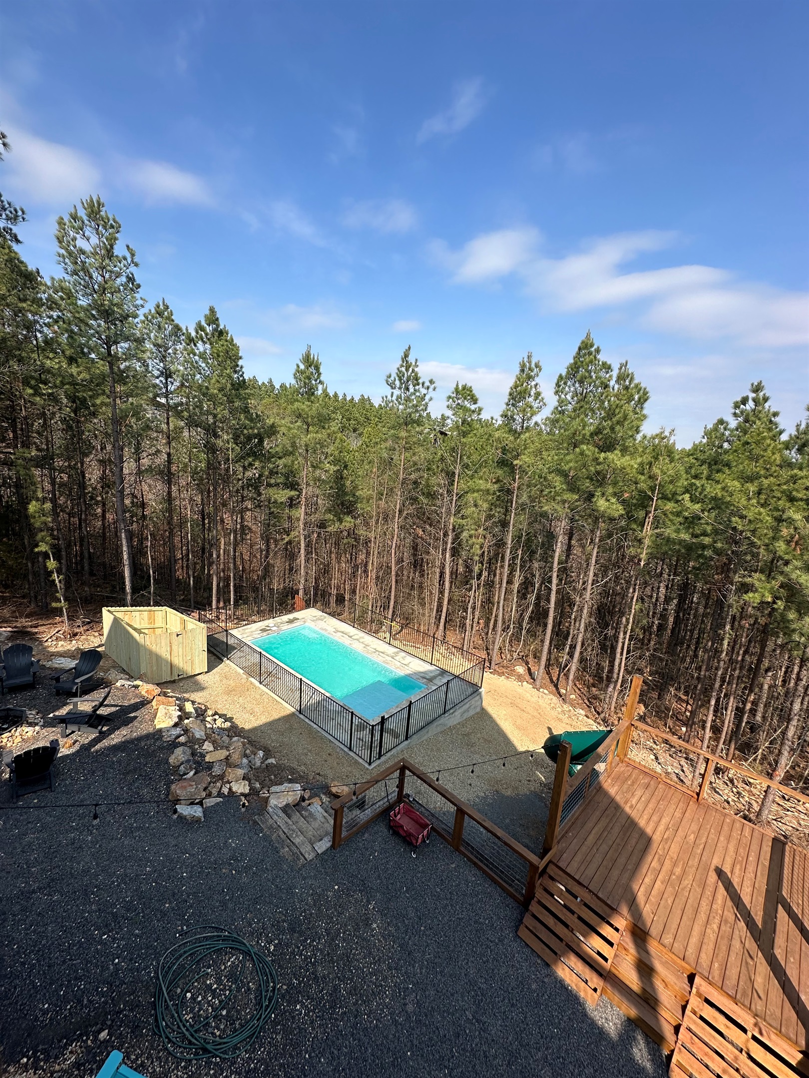 step into tranquility — a secluded pool setting where luxury meets the natural beauty of hochatown.