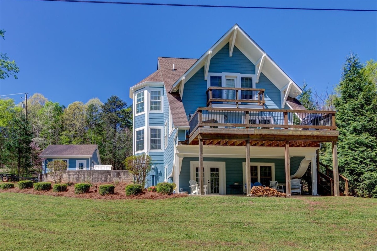 The back of our home w/separate game room