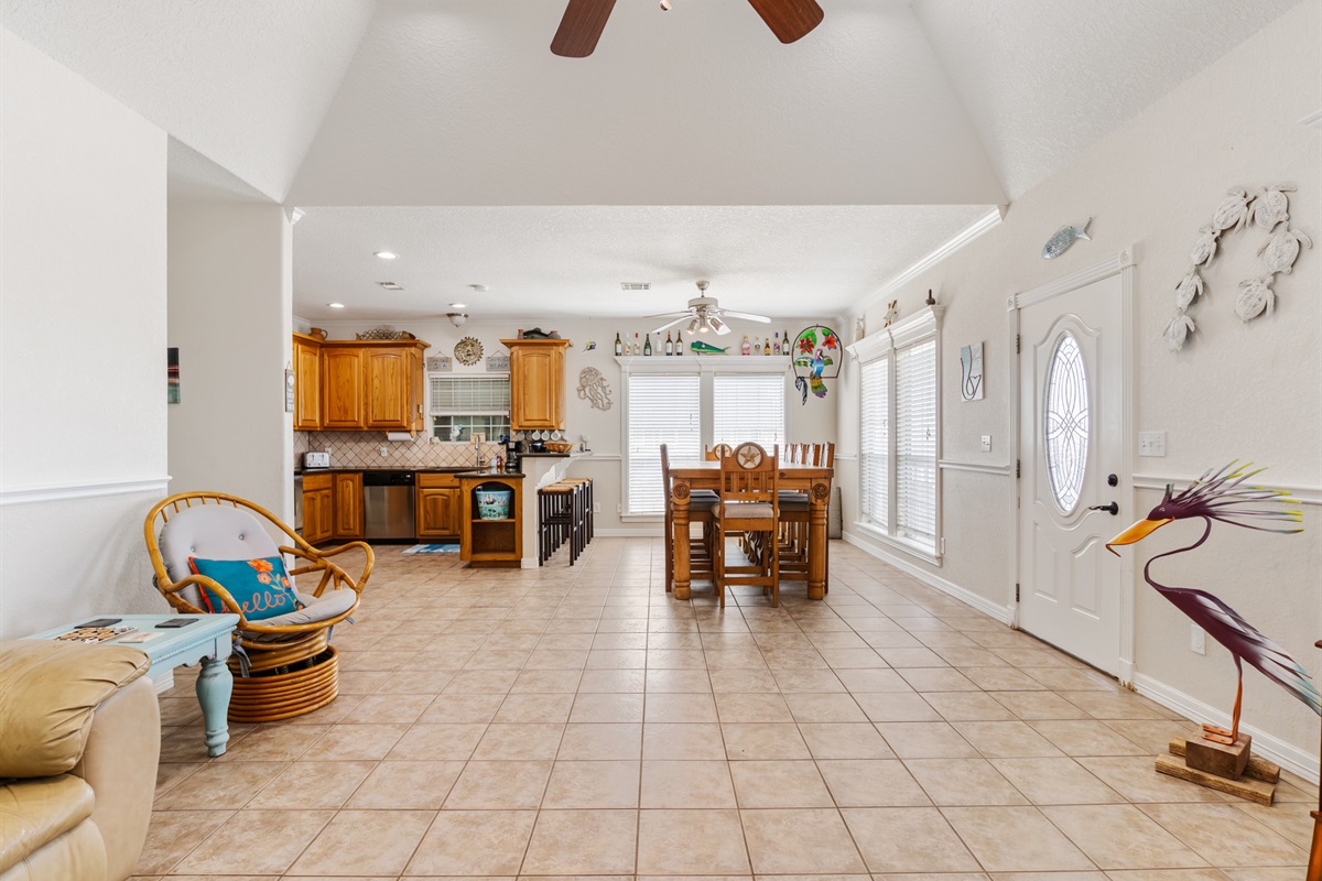 View of dining room and kitchen from living room. Dining room table seats 10