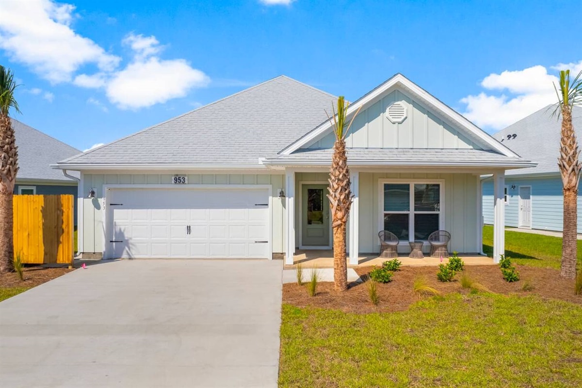 Charming front yard complemented by a relaxing private balcony.
