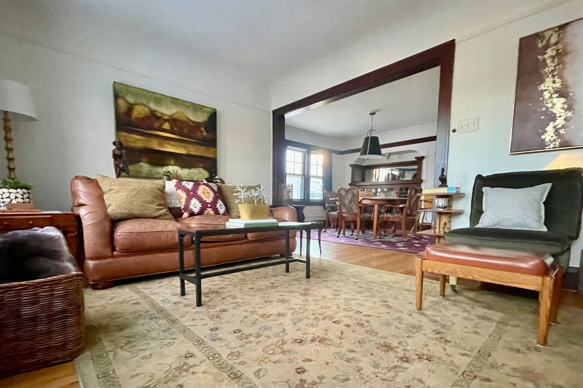 A comfortable and inviting living area featuring cozy seating, layered textures, and vintage-inspired details—perfect for relaxing between adventures.