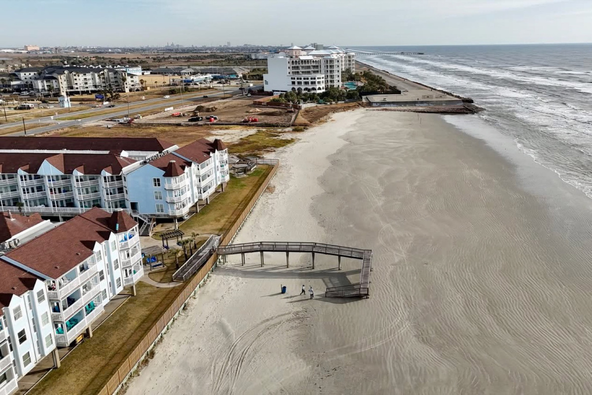 Another view of paradise—private balconies, heated pools, and unbeatable beachfront access from every angle.