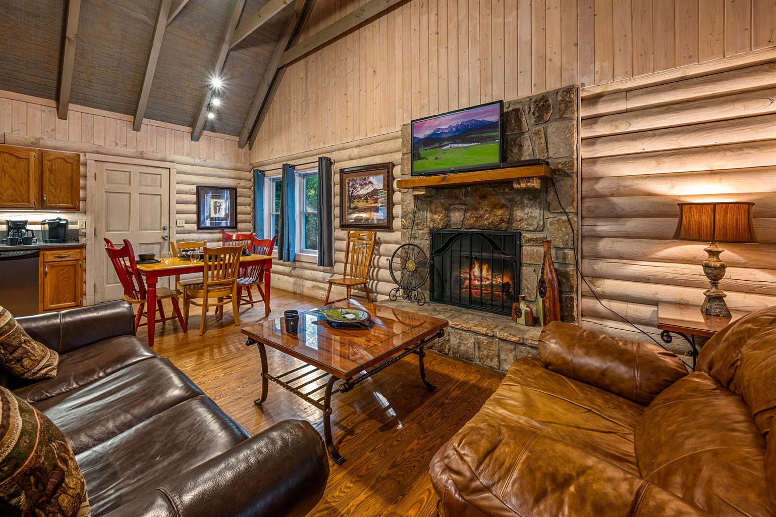 Cozy up! Enjoy the fireplace, TV, and dining in your cabin.