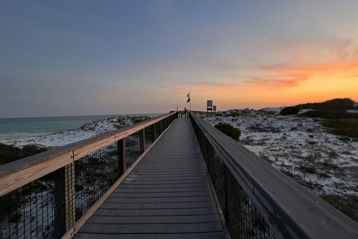 Nearby beach access via protected boardwalk.