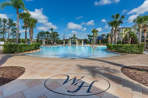 Lagoon style (double Olympic-sized), heated pool with water park.