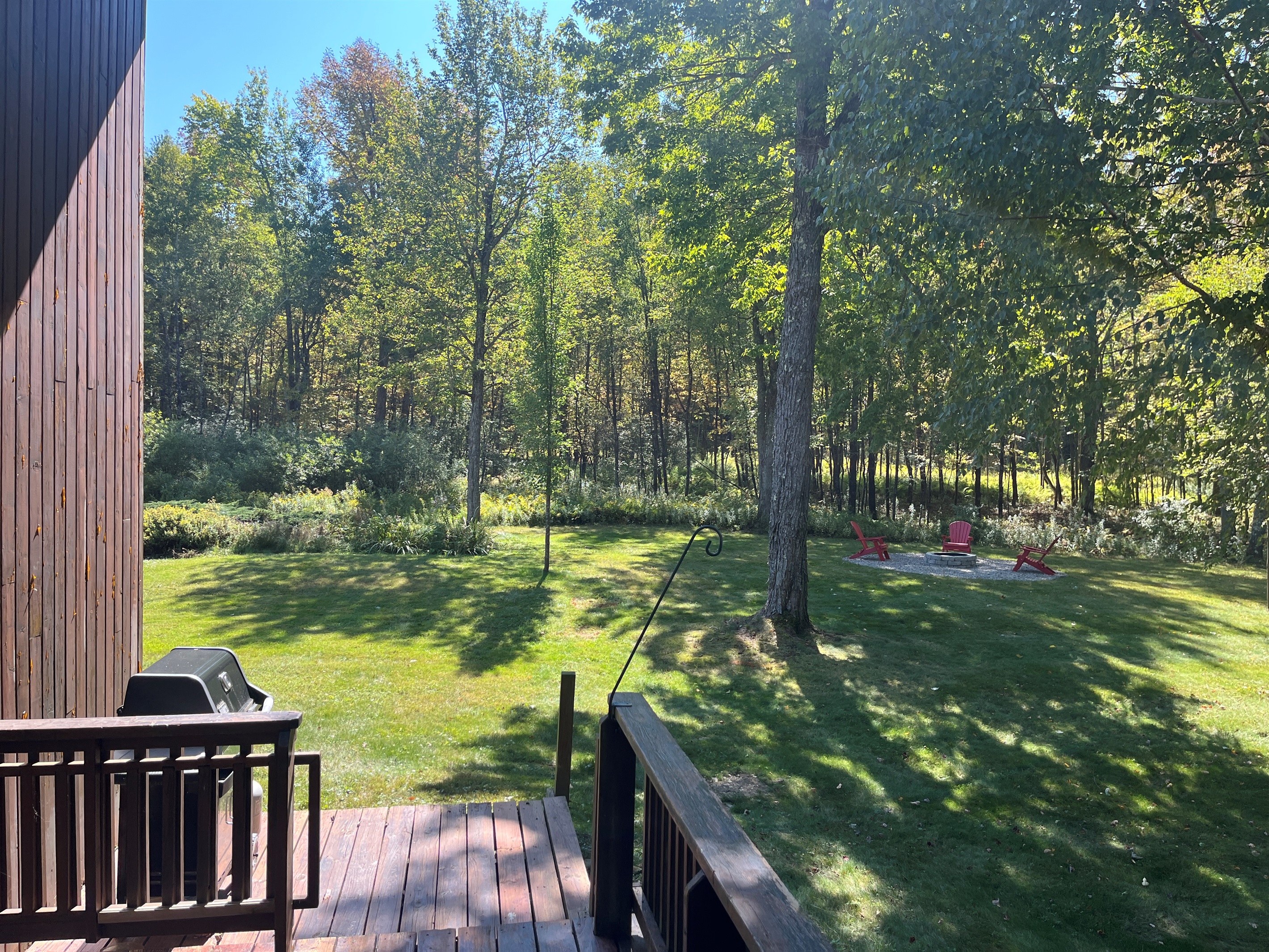 Outdoor firepit just across the back yard