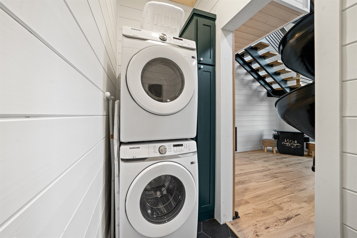 The laundry nook provides a full size washer/dryer, iron and ironing board for guest convenience.  