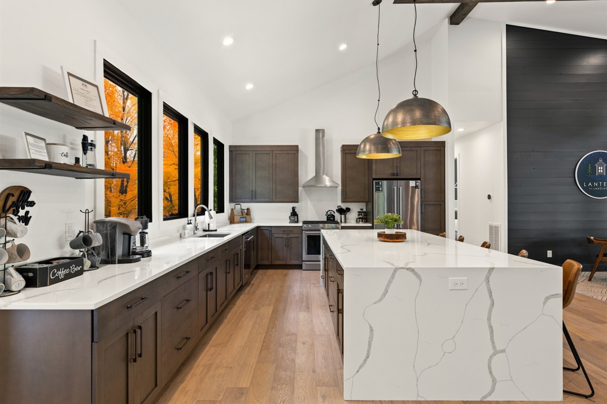 A beautifully designed kitchen equipped with premium appliances and ample space for creating meals or entertaining guests.