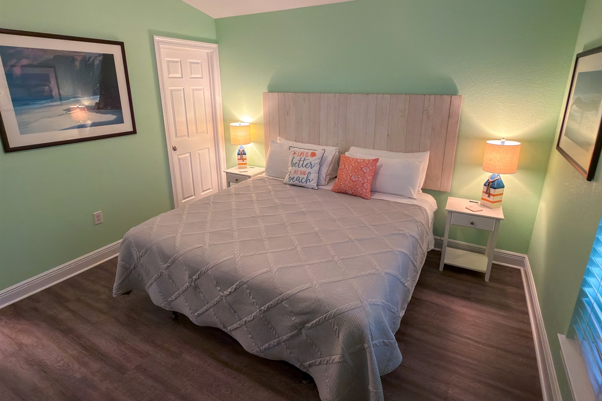 This charming escape pairs a bright coastal palette with peaceful comfort, creating a quiet space to settle in and truly unwind.
