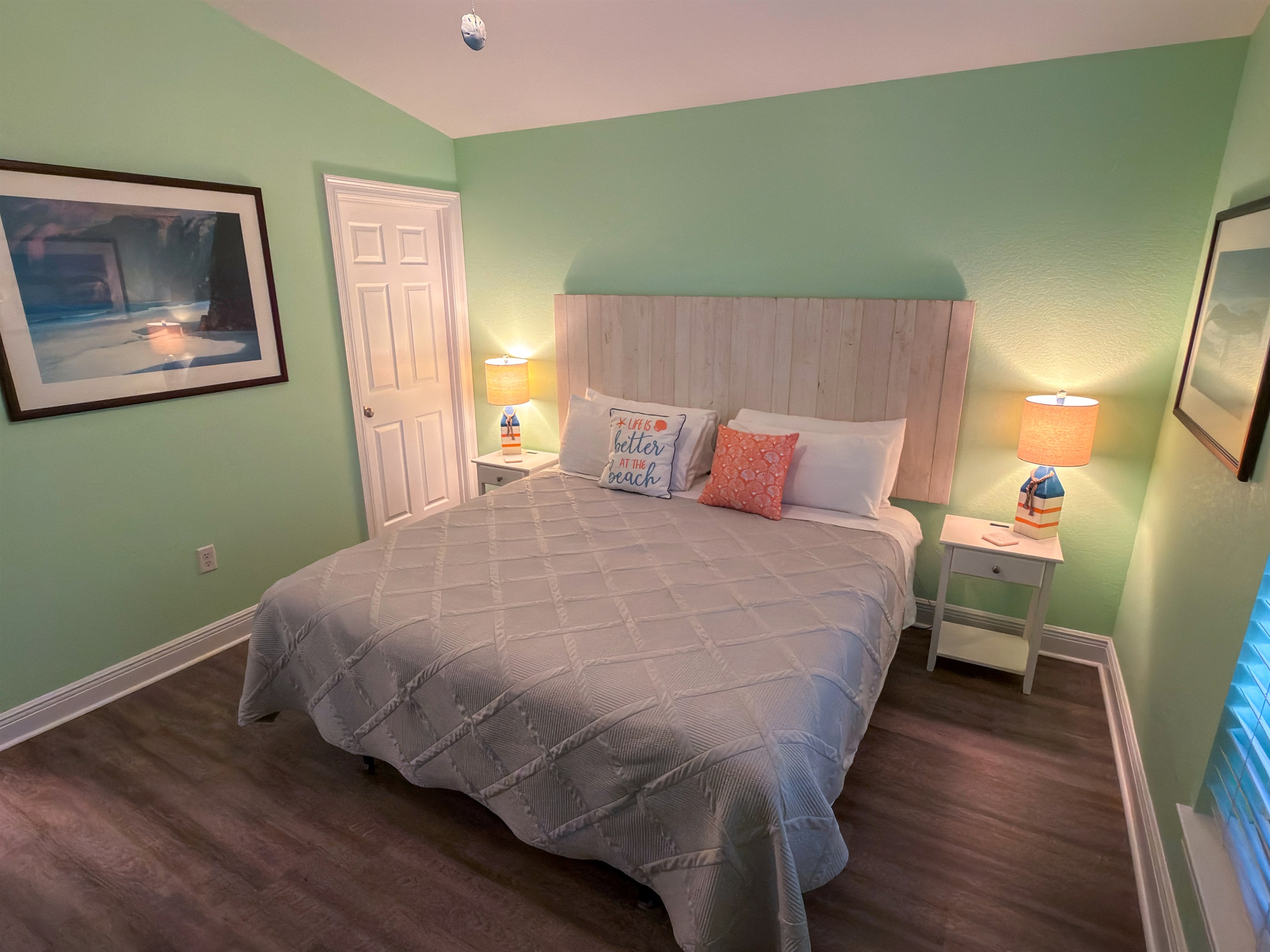 This charming escape pairs a bright coastal palette with peaceful comfort, creating a quiet space to settle in and truly unwind.
