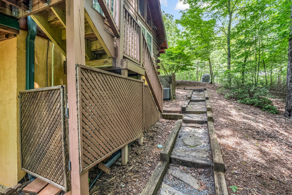 Walkway adjoining front and back of property