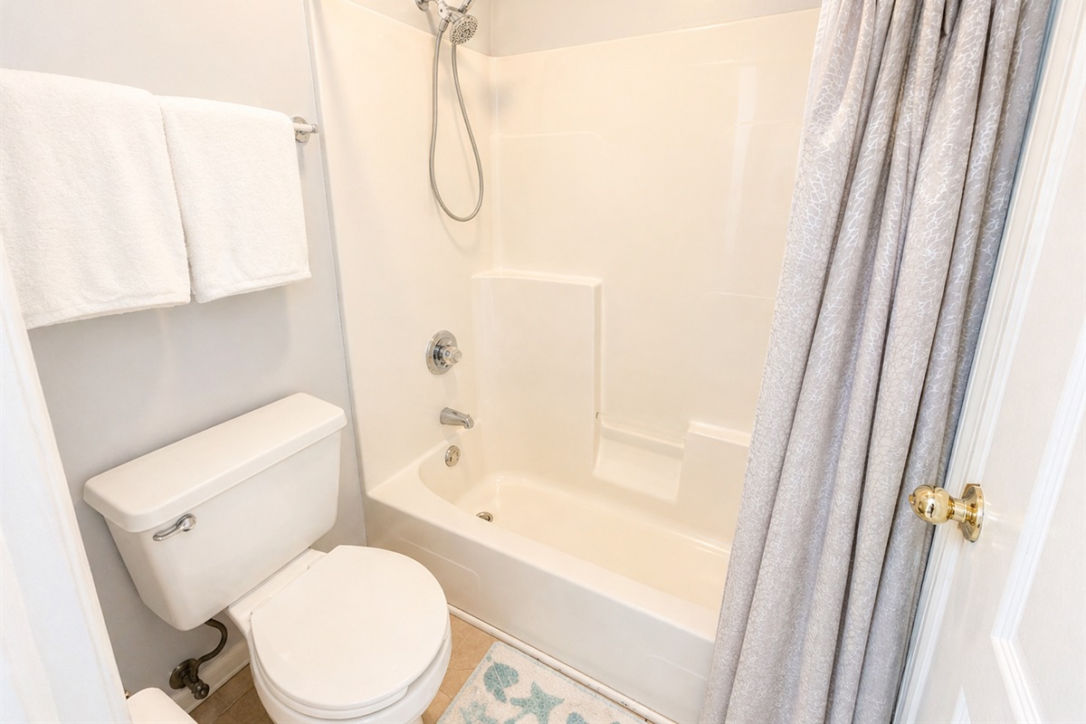 Full bathroom with a combination tub/shower