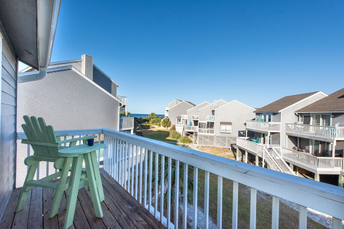 Sink into the Adirondack chairs on the master deck &mdash; shade, a breeze off the Gulf, and nowhere you need to be.