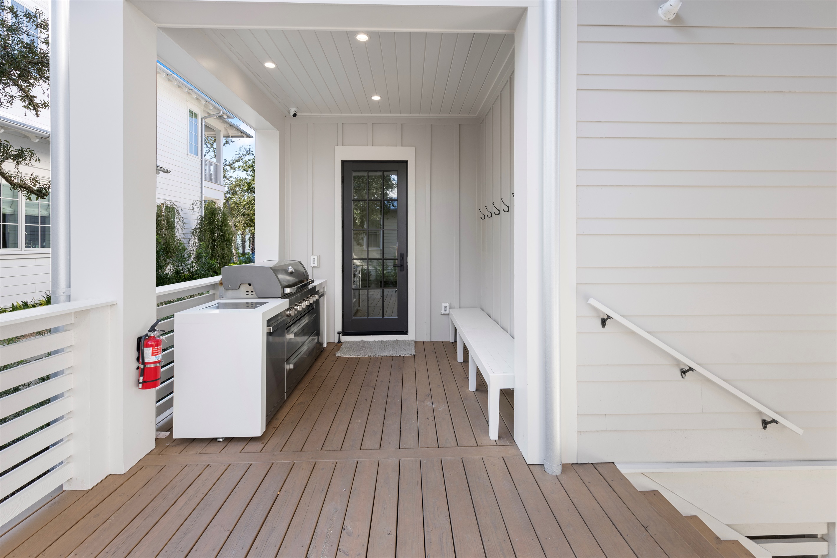 Outdoor Kitchen + Entry to Laundry Room/Mud Room
