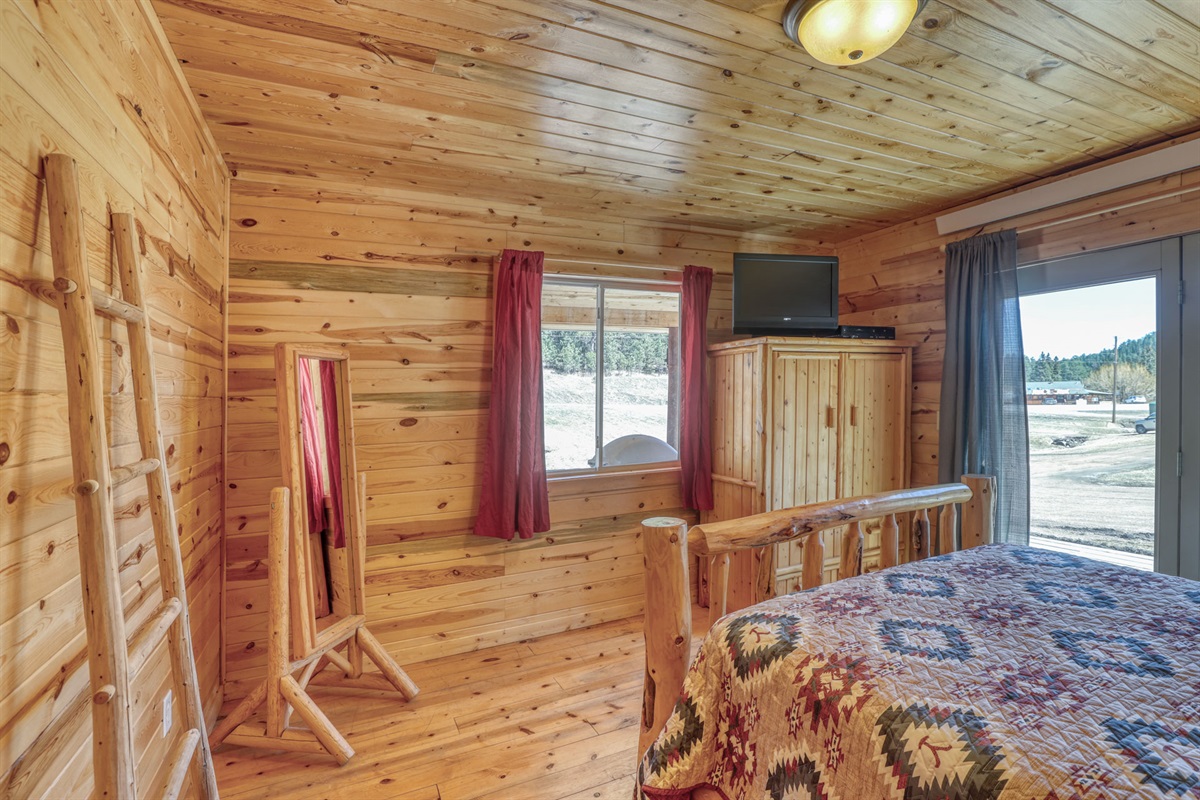 Master bedroom with Queen bed and TV