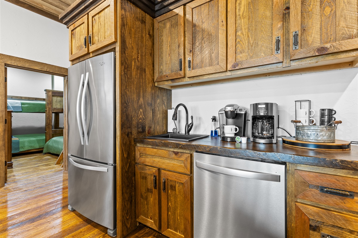 The downstairs kitchenette makes entertaining a breeze, perfect for prepping drinks or quick bites.