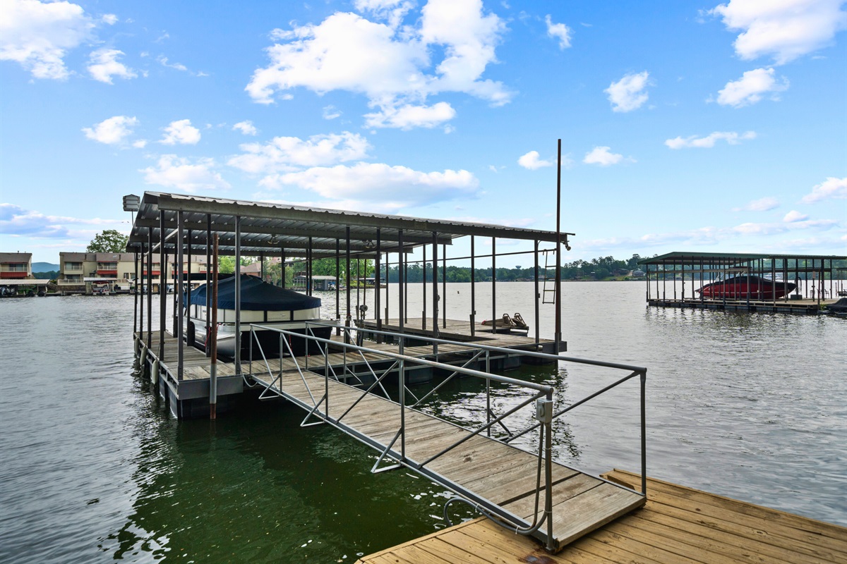 Whether you’re heading out for a day of boating or returning home, this serene dock ensures a seamless connection to the water.