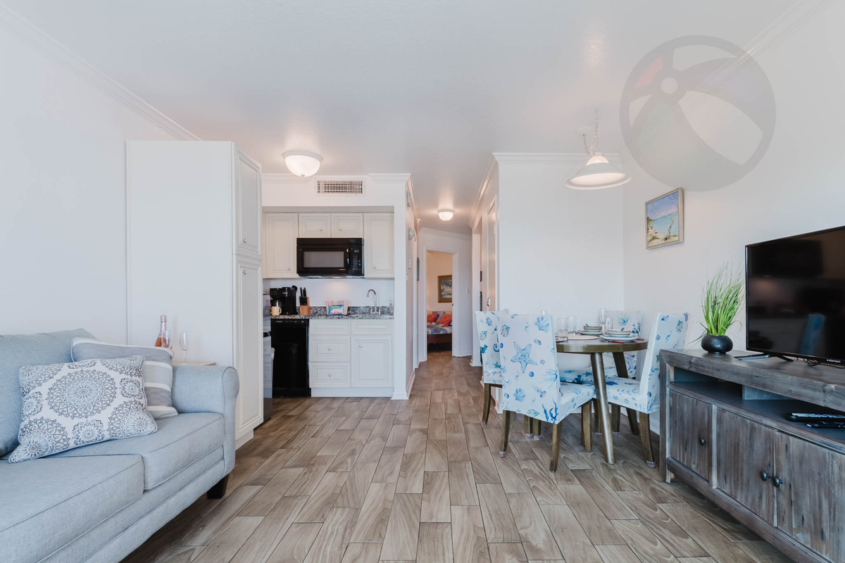 From the balcony you'll see the open concept living, dining and kitchen