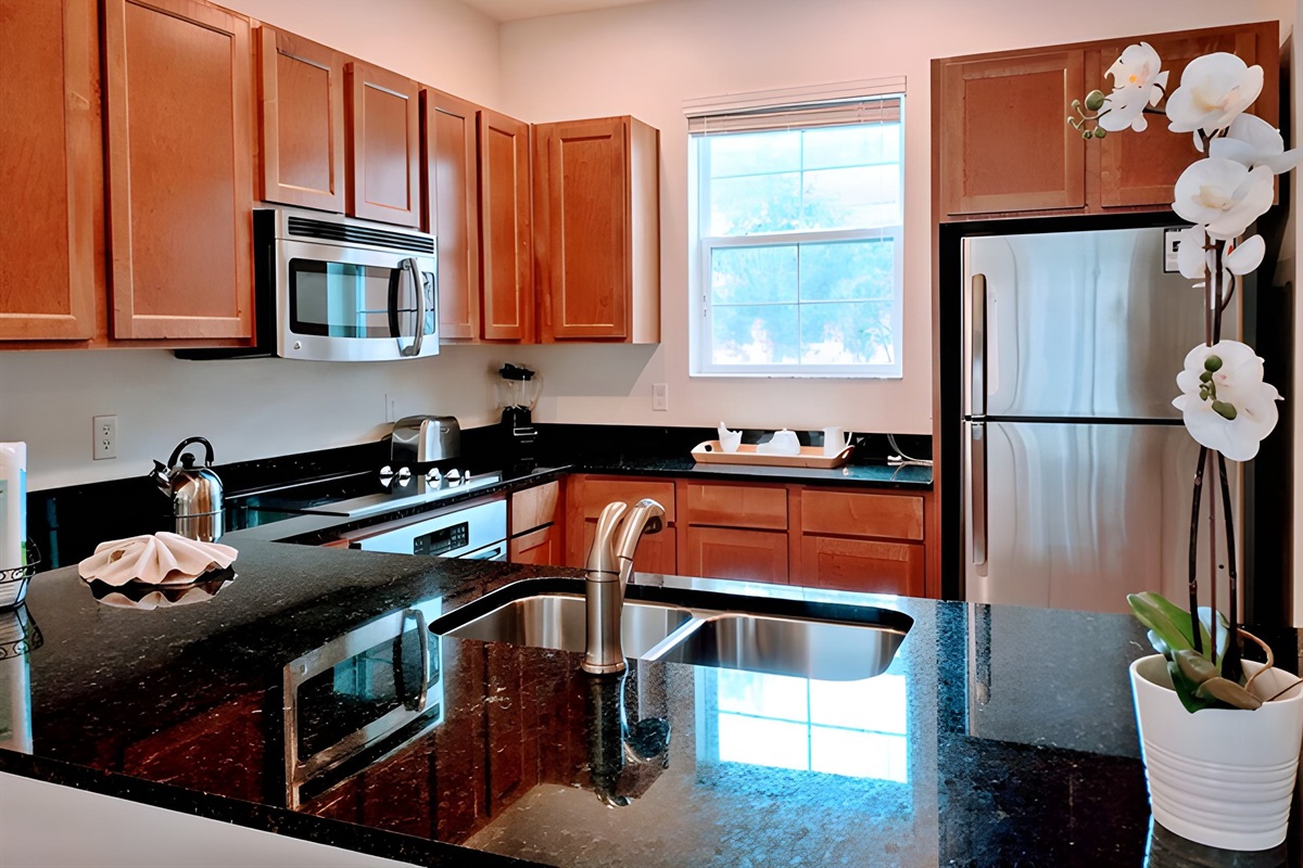 Granite countertops, stainless steel appliances