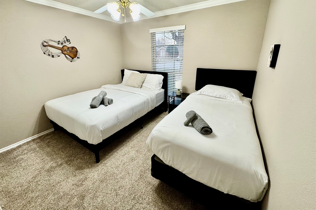 Relax in Our Cozy Queen & Twin Suite — Hotel-Quality Bedding & Peaceful Ambience