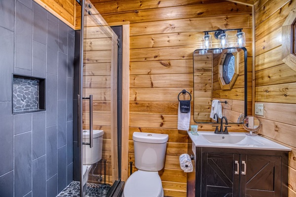 Upstairs Master bedroom #2 has a full private bathroom that has sink, toilet, and walk-in shower. 