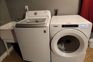 Experience the luxury of laundry convenience with our efficient washer and dryer duo, ensuring your clothes are cared for with the utmost ease.