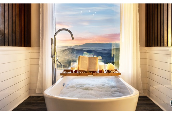 Take in that MAJESTIC mountain view from the big window while soaking in this freestanding tub. It'll make you feel like stepping into a postcard you always dreamed of in a lifestyle magazine. Enjoy your stay.