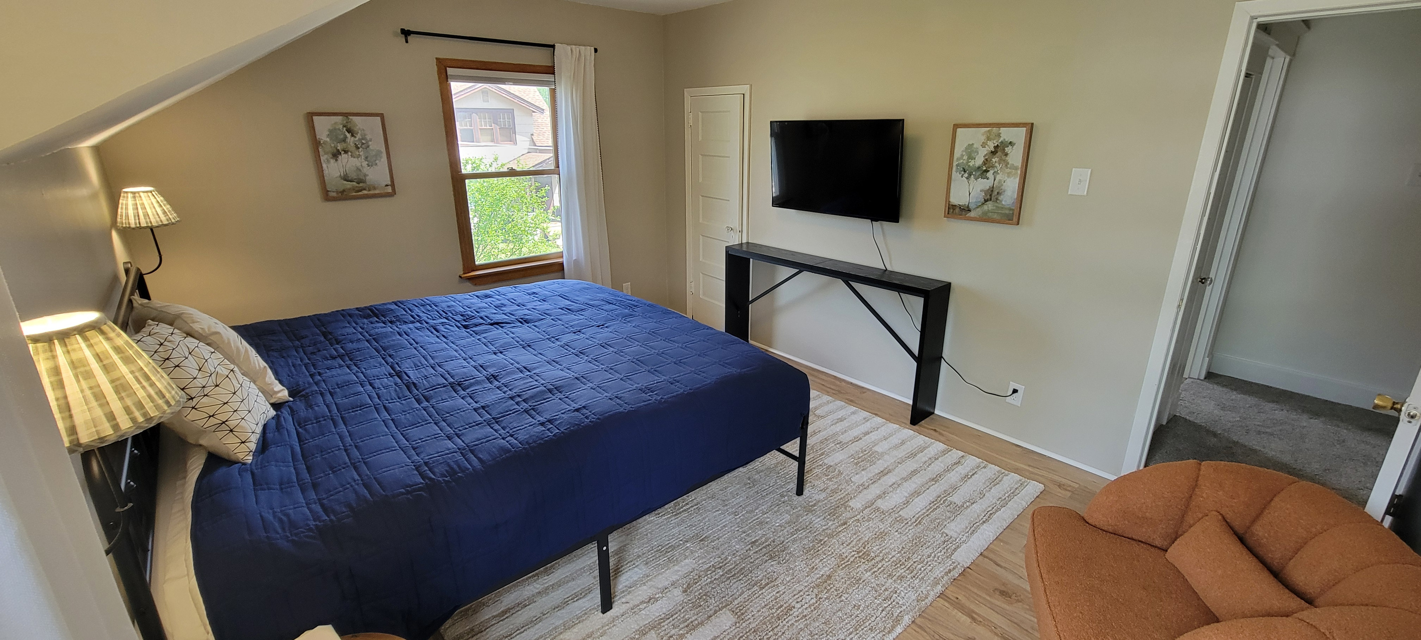 Main bedroom with TV and two closets for unpacking and relaxing during your stay.
