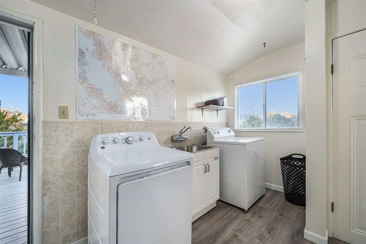 Large laundry room with free washer and dryer are in the unit.