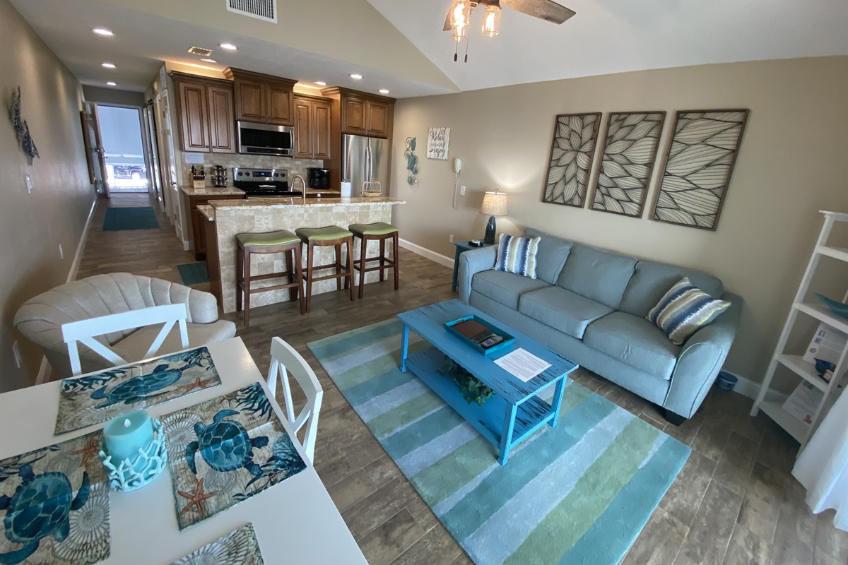 Living and Dining Area with bar seating off of kitchen!