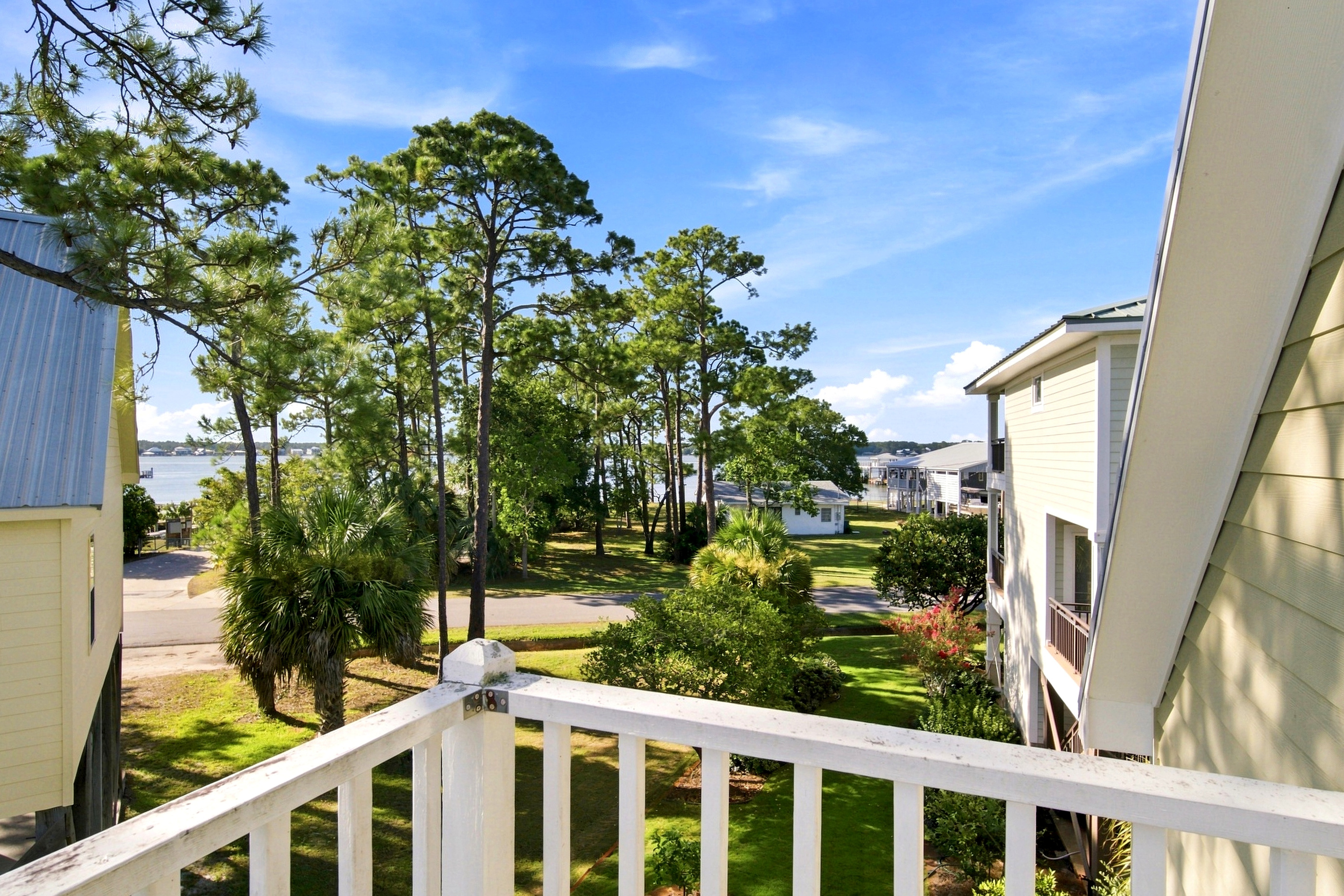 Take in the  Bear Point neighborhood from one of the home's upper-level decks.