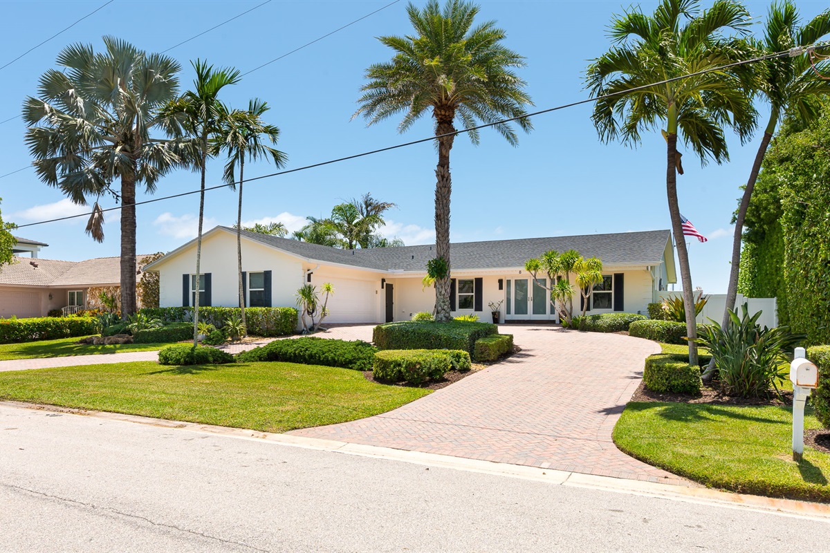 Enjoy effortless one-story living in the serene and sought-after coastal community of Ocean Ridge.