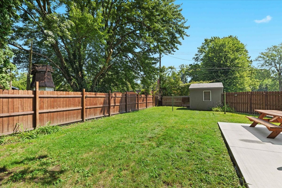 Large fenced backyard ideal for games and gatherings
