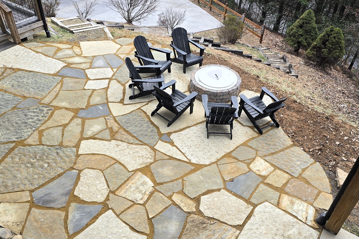 Firepit on the edge of a large, private courtyard