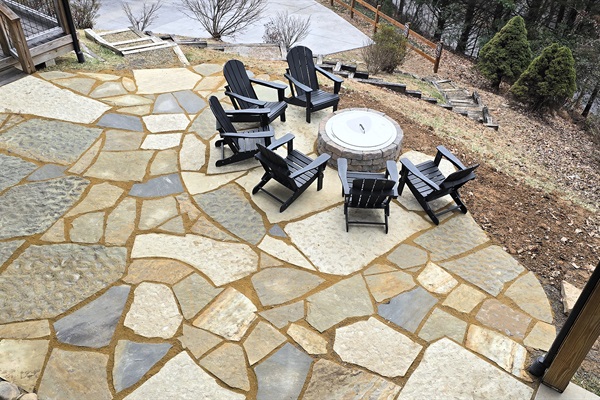 Firepit on the edge of a large, private courtyard