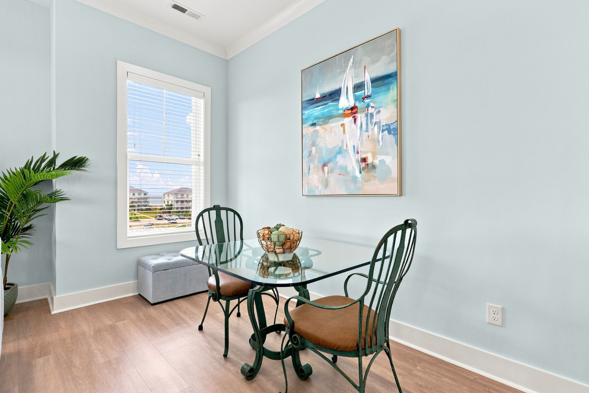 Gather around the dining table for family meals, game nights, and memorable moments surrounded by coastal charm