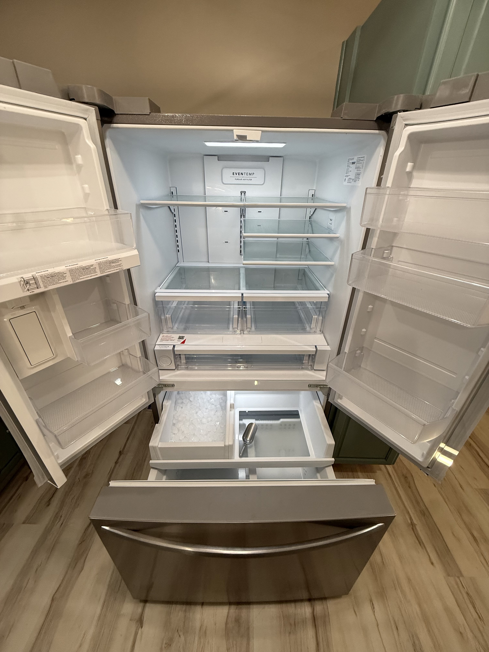 Full sized refrigerator/freezer with filtered water dispense and ice maker