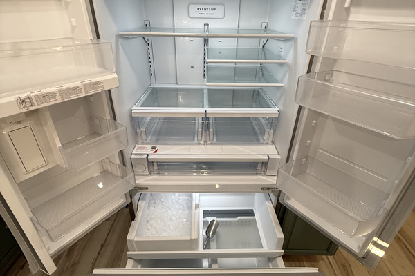 Full sized refrigerator/freezer with filtered water dispense and ice maker