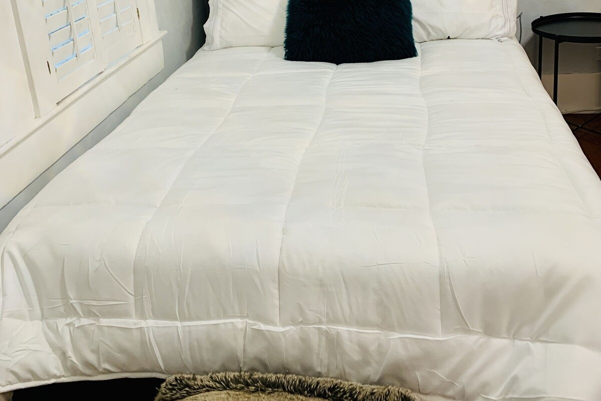 The full-sized bed also includes built-in bed lamps with usb chargers.