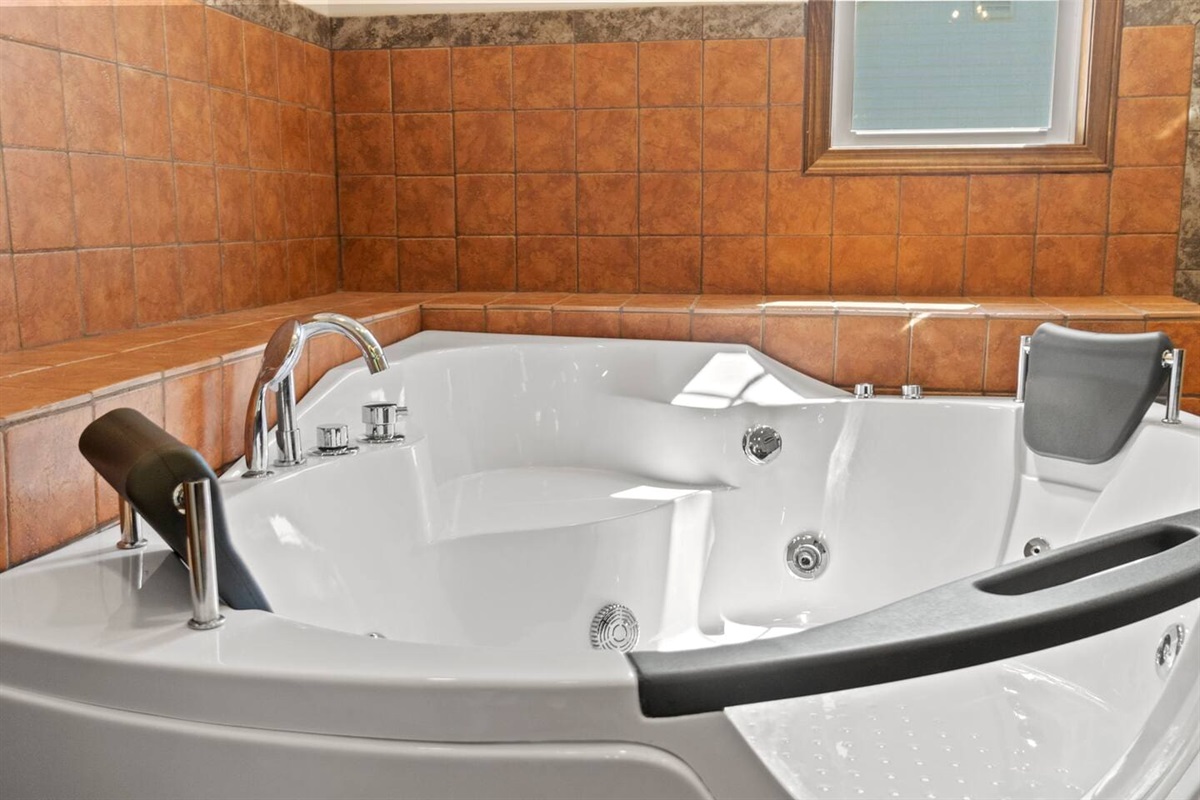 Enjoy the ultimate relaxation in the indoor jacuzzi, perfect for unwinding after a long day.