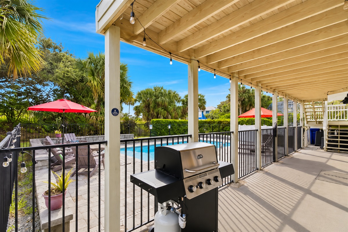 Grill and BBQ as people swim 