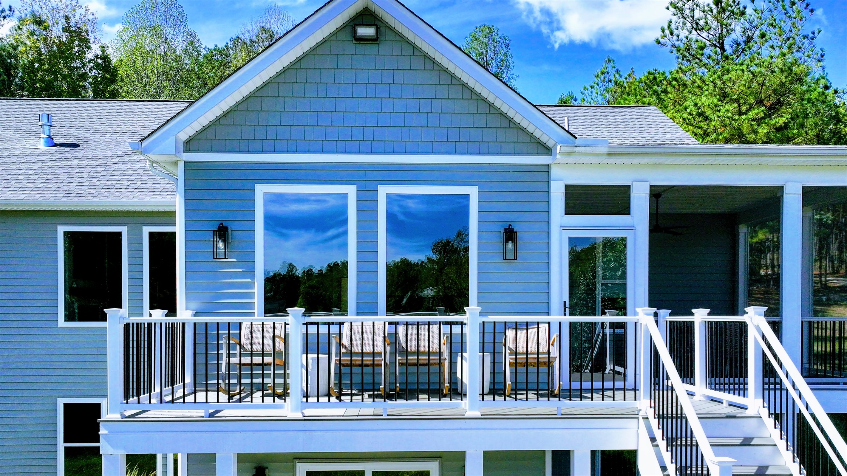 Relax on this spacious deck with stunning lake views! Sip your morning coffee, enjoy the fresh air, and watch the sunset over the water. The perfect spot for unwinding and taking in the beauty of nature.
