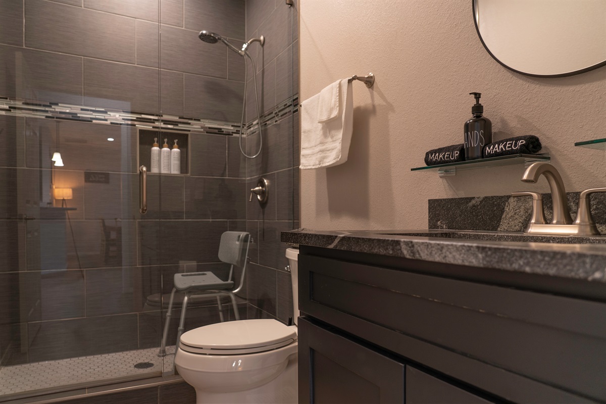 Family bathroom with shower chair ready