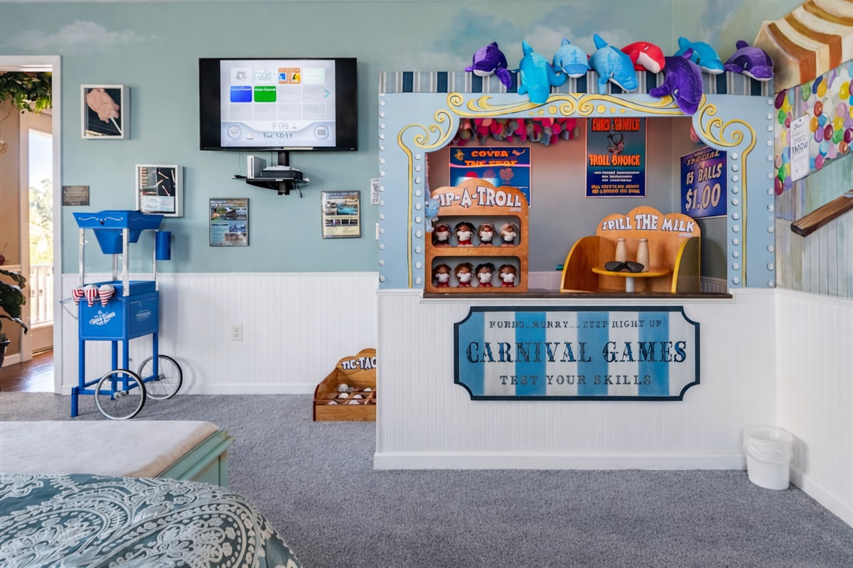 enjoy carnival games in the cotton candy master bedroom!