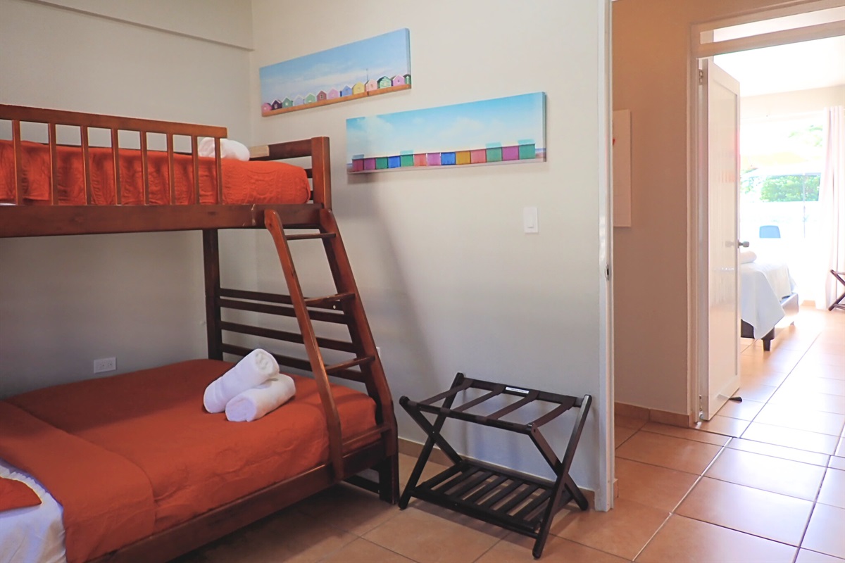Bunk Room: Vibrant bunk beds and colorful decor create a fun retreat for the family!